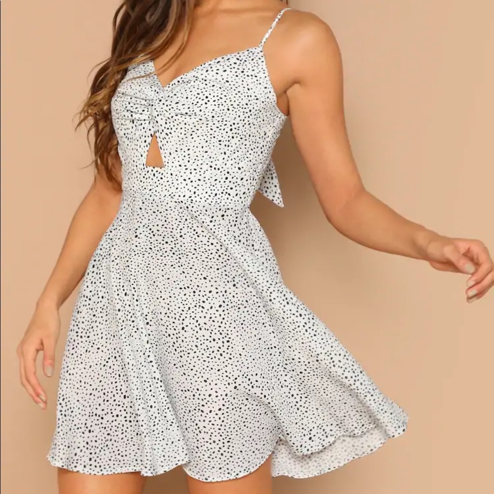 White polka dot swing dress